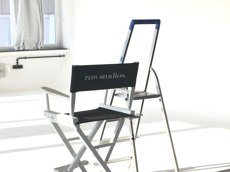 Spacious yoga studio with minimal decor and sunlight.